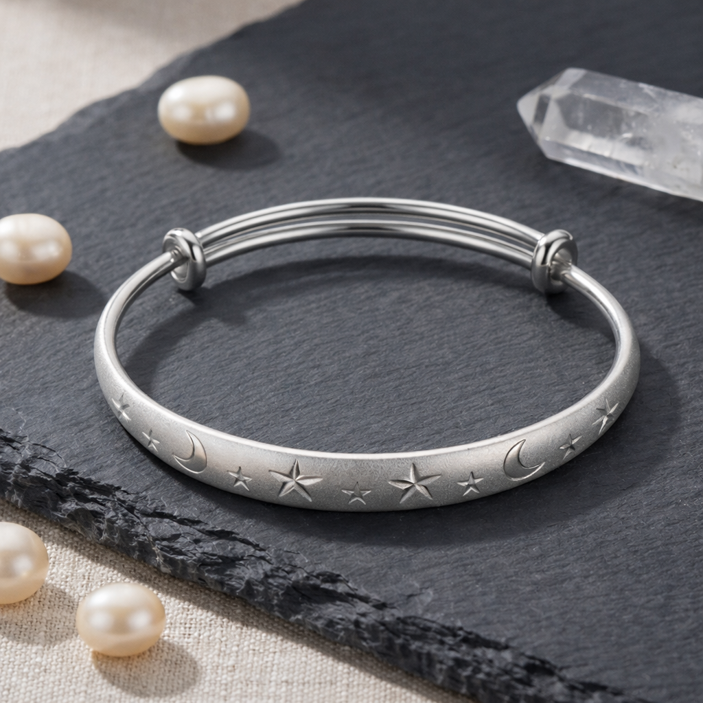 Celestial Star and Moon Engraved Bangle