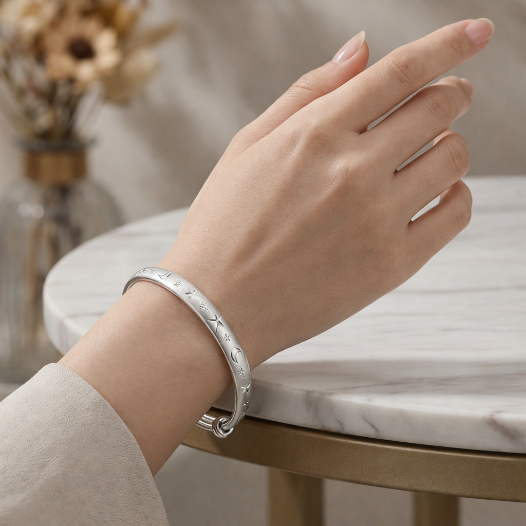 Celestial Star and Moon Engraved Bangle