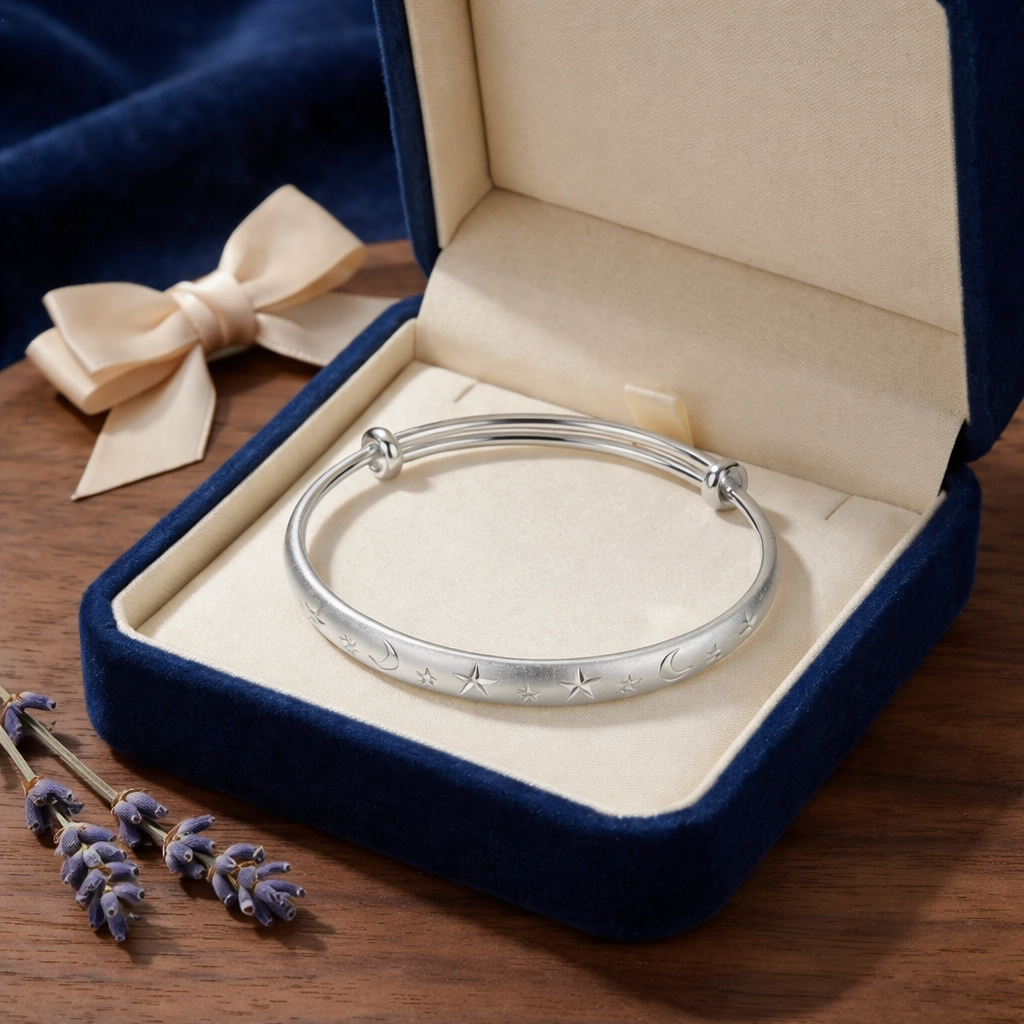 Celestial Star and Moon Engraved Bangle